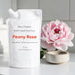 Peony Rose refill liquid hand soap with a pink flower and ceramic bowl on a white surface.