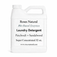 White laundry detergent container with text on a white background Roses Natural 