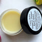 Oma Baby Organic Diaper Rash Balm jar with black lid on a white background