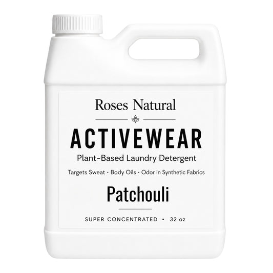 White laundry detergent container with 'Roses Natural' branding on a white background Activewear Patchouli