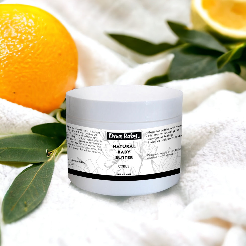 Jar of natural baby butter with oranges and leaves on a white background