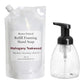 Refillable hand soap system with pump bottle and packaging labeled 'Roses Natural'.