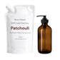 Patchouli refill liquid hand soap packaging with brown bottle and white pouch on a white background