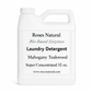 White laundry detergent container with text on a white background Mahogany Teakwood scent