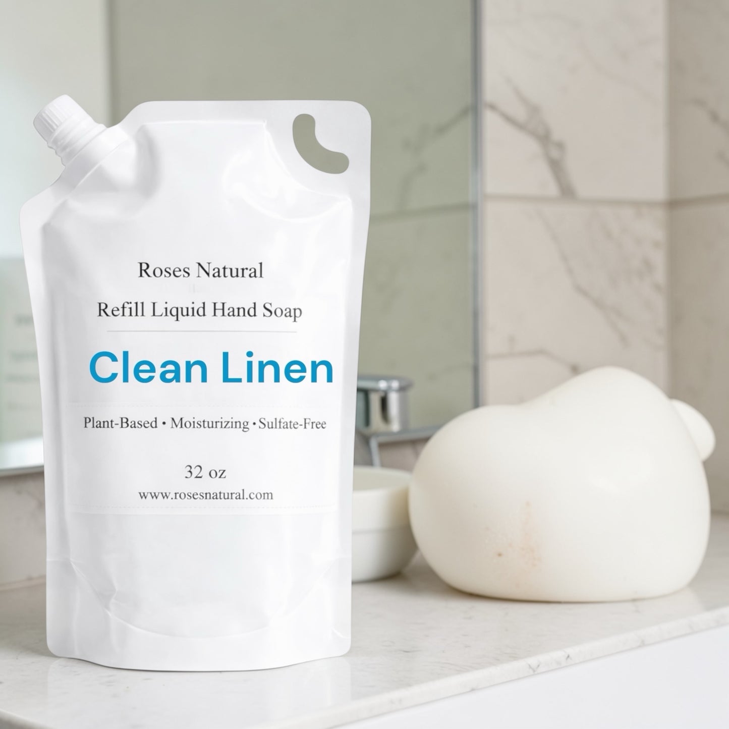 Refill liquid hand soap container labeled 'Clean Linen' on a bathroom counter.