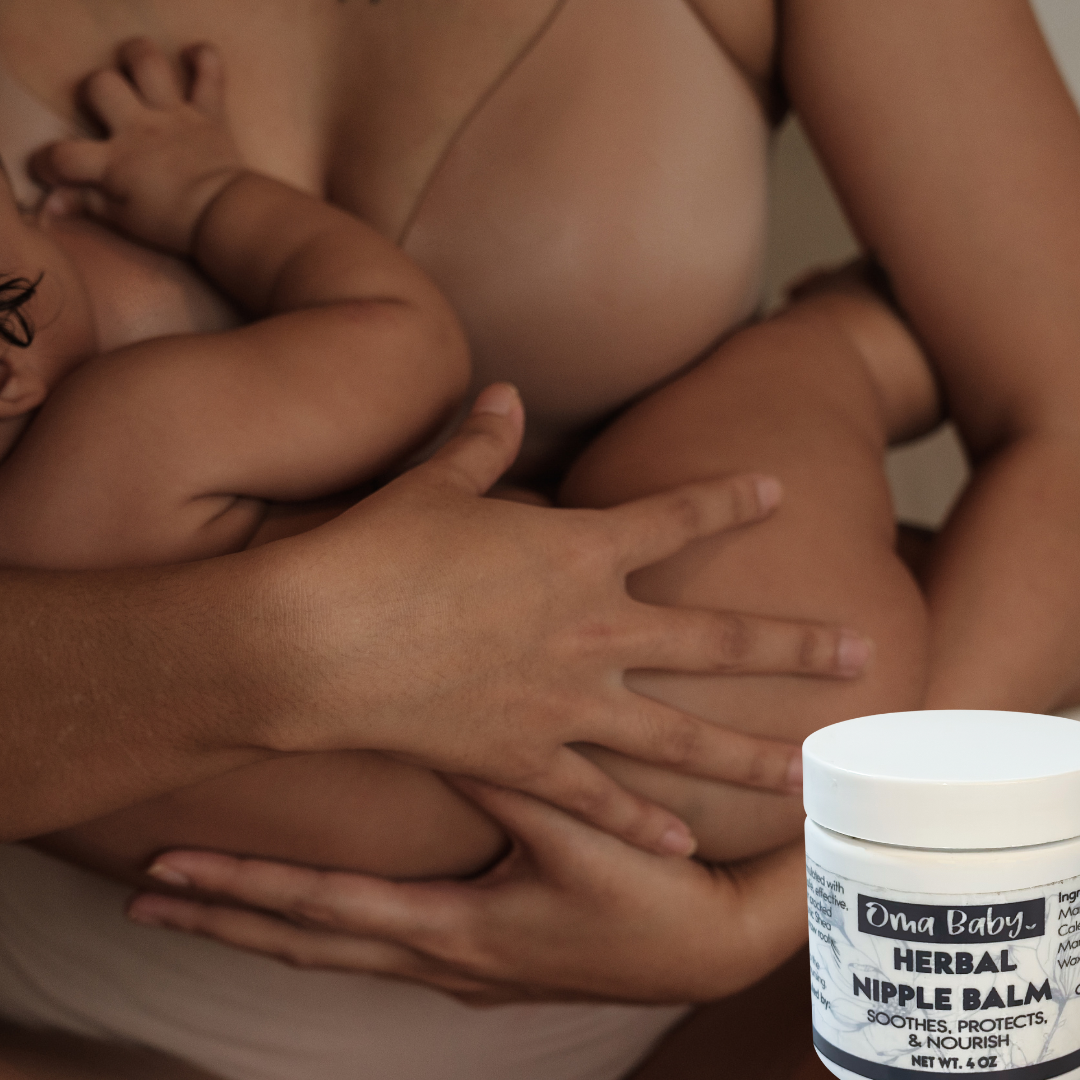 Person holding a baby with a container of Ora Baby Herbal Nipple Balm in the foreground.