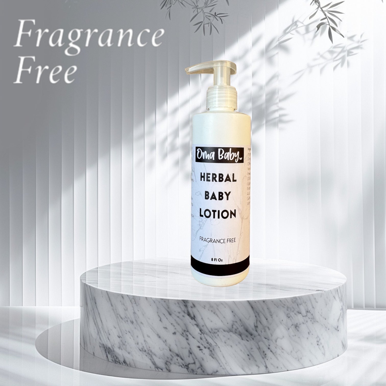 Olive Baby Herbal Baby Lotion bottle on a marble pedestal with a light gray background