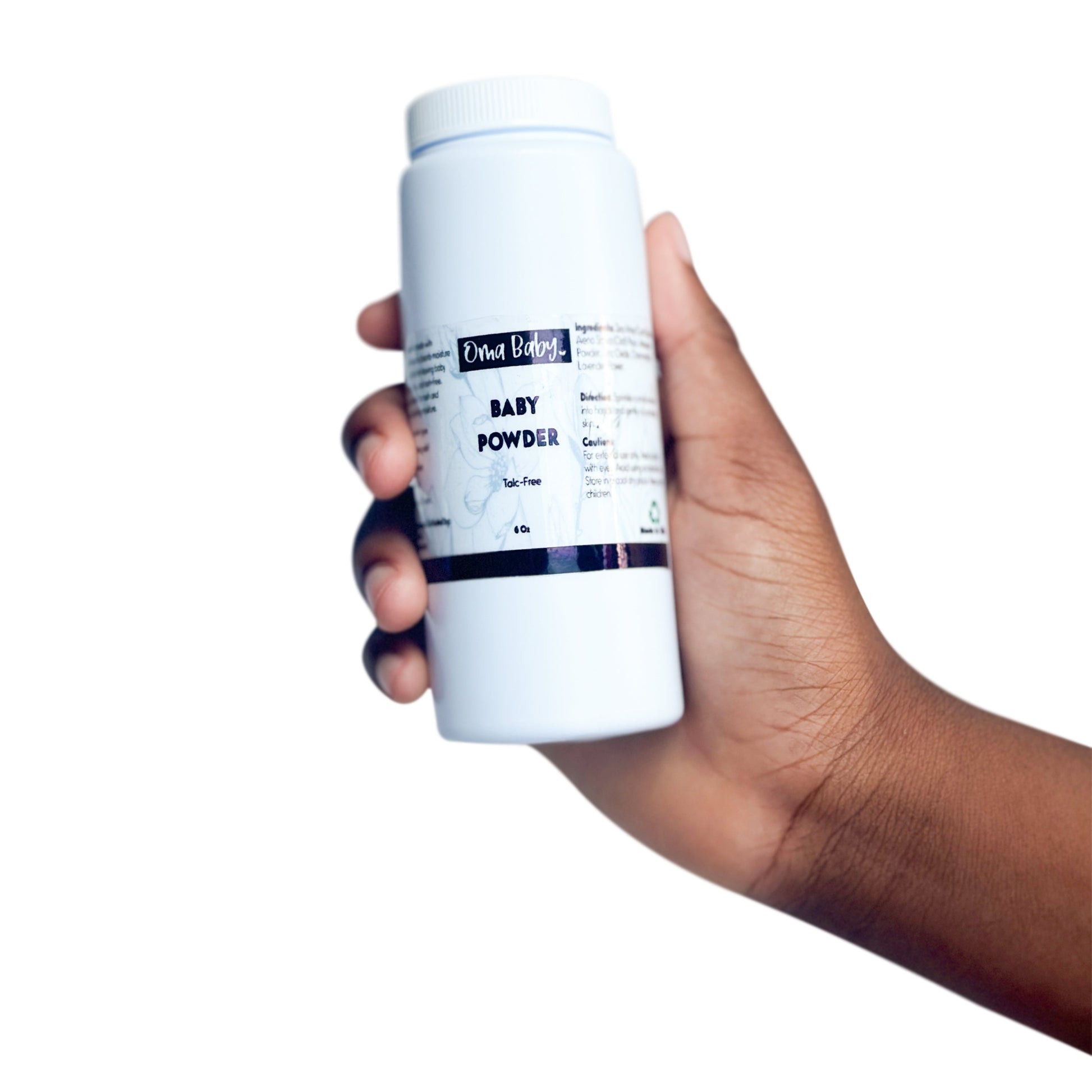 Hand holding a container of baby powder with a white background