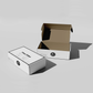White packaging box with a brand logo on a light gray background