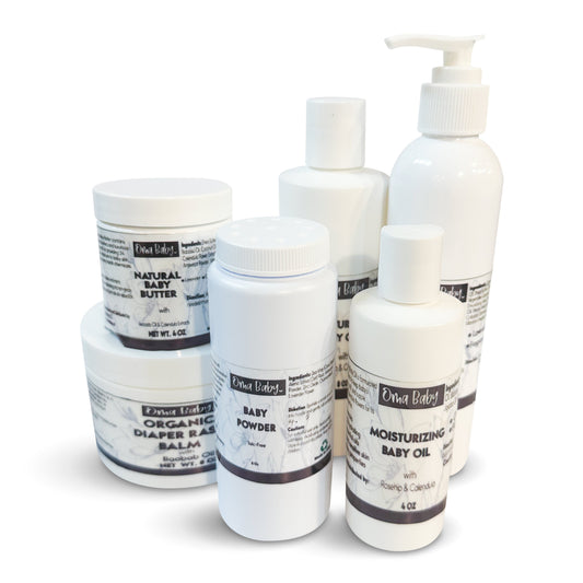 Collection of baby care products including bottles and jars on a white background